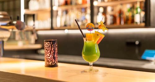 a drink sitting on top of a table at Sure Hotel by Best Western Hilden-Düsseldorf in Hilden