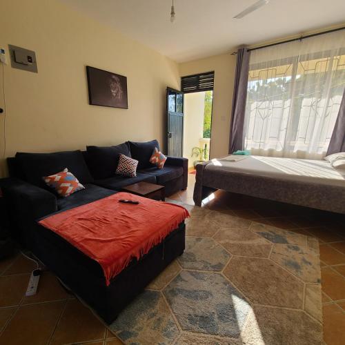 Postel nebo postele na pokoji v ubytování Breezy homes