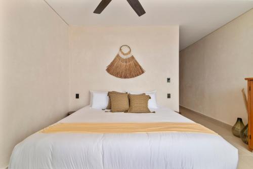 Ένα ή περισσότερα κρεβάτια σε δωμάτιο στο Guest INN Home - Elements Suites