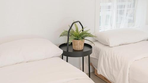 Postel nebo postele na pokoji v ubytování Taean Fringe OceanView Pension