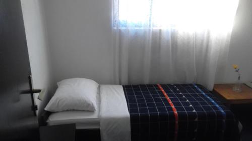 Una cama o camas en una habitación de Motel Hrasno