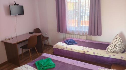 Postel nebo postele na pokoji v ubytování Anastasia