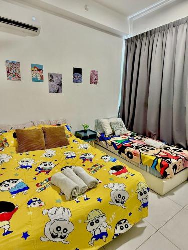 Postel nebo postele na pokoji v ubytování Crayon ShinChan 3R2B SeaView Suite