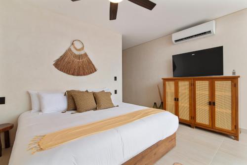 Ένα ή περισσότερα κρεβάτια σε δωμάτιο στο Guest INN Home - Elements Suites