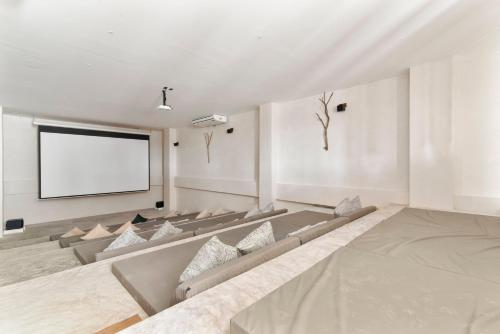 Ένα ή περισσότερα κρεβάτια σε δωμάτιο στο Guest INN Home - Elements Suites