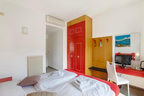 Letto o letti in una camera di Bike & Wind Hotel Villa Maria