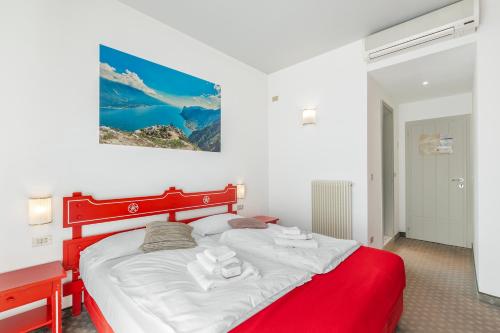 Letto o letti in una camera di Bike & Wind Hotel Villa Maria