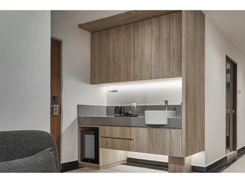 Cuisine ou kitchenette dans l'établissement Metro Y Hotel Singapore
