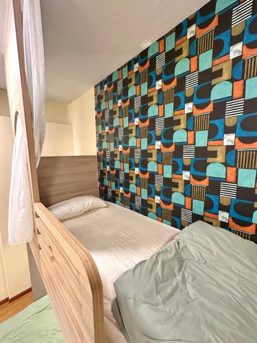 Postel nebo postele na pokoji v ubytování Nest Inn Kampar 2R2B for 16pax
