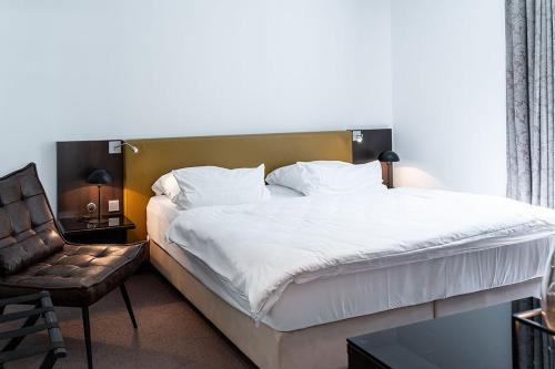 Apartmentanlage Seezeichenにあるベッド