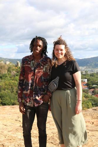 a man and a woman standing on top of a hill at EMMY'S HIDE AWAY in Iringa
