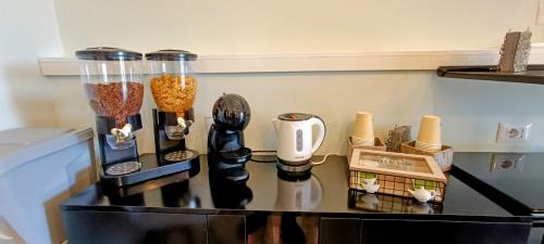 a counter with a blender and other items on it at CaLaDream B&B in Trebisacce