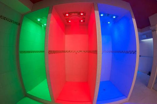 a room with a rainbow colored elevator in a room at Residence Hotel Matilde in Carpineti