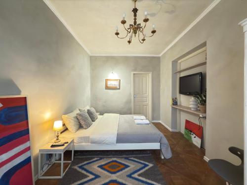 Posteľ alebo postele v izbe v ubytovaní Art apartment on Rynok Square