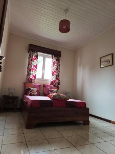 Ένα ή περισσότερα κρεβάτια σε δωμάτιο στο Appartement Maïmouna