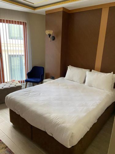 Кровать или кровати в номере Istanbul Town Hotel
