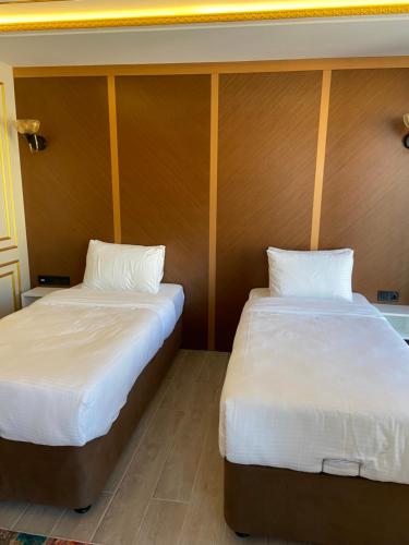 Кровать или кровати в номере Istanbul Town Hotel