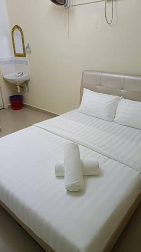 Ein Bett oder Betten in einem Zimmer der Unterkunft Cool view hotel