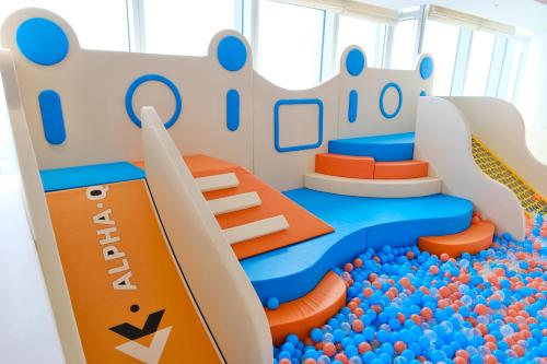 a childrens play room with a water slide at Na Lotus Hotel, a Luxury Collection Hotel, Nanning in Nanning