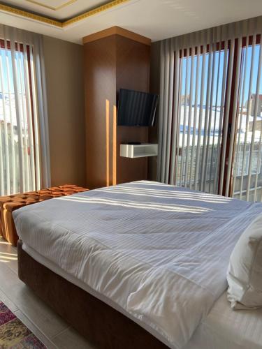 Кровать или кровати в номере Istanbul Town Hotel