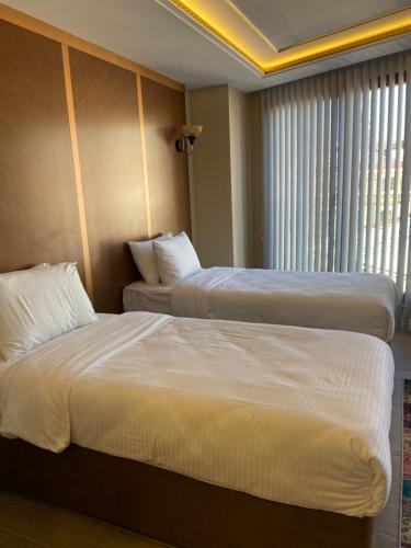Кровать или кровати в номере Istanbul Town Hotel