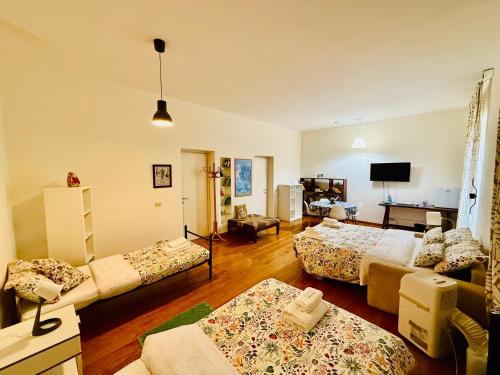 Postel nebo postele na pokoji v ubytování TURATI ROOMs
