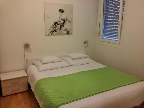 Łóżko lub łóżka w pokoju w obiekcie Apartment Josip Split