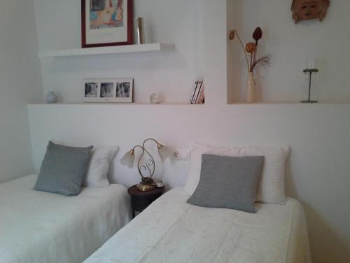 A bed or beds in a room at Apartment 241