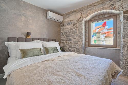 Posteľ alebo postele v izbe v ubytovaní Magnolia Luxury Rooms