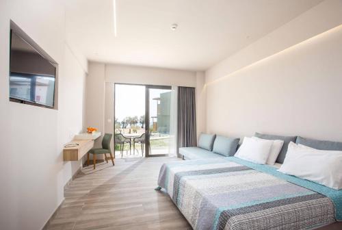 Postel nebo postele na pokoji v ubytování Gennadi Seaside Resort