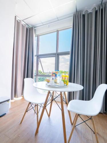 Posezení v ubytování Savan Itecc Hotel