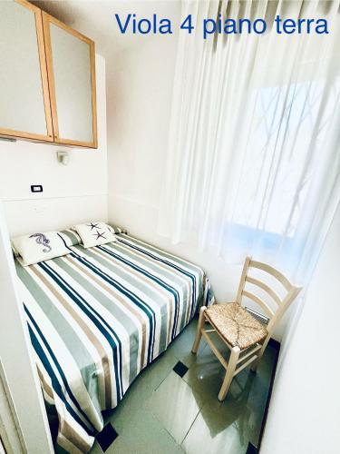 Residence Ariesにあるベッド