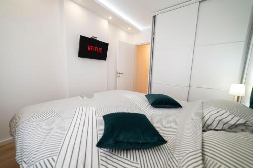 Ένα ή περισσότερα κρεβάτια σε δωμάτιο στο Apartment Premium Deny