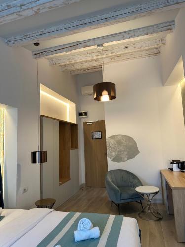 Ένα ή περισσότερα κρεβάτια σε δωμάτιο στο House4You - Blanari