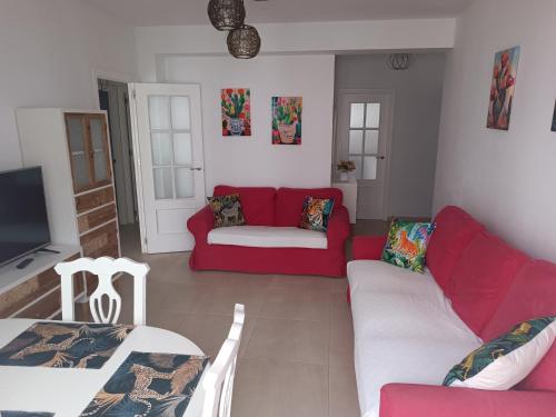 A seating area at Fantástico piso en el centro 2°linea de playa