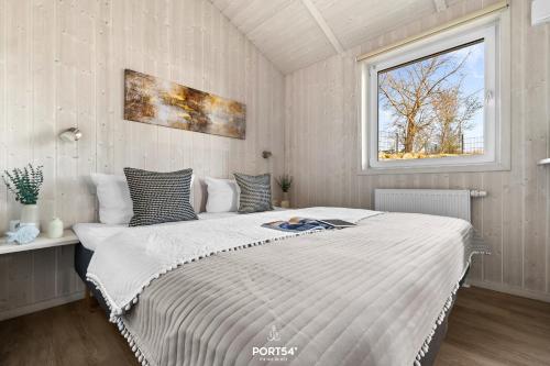 En eller flere senge i et værelse på Ferienhaus Bellevue - Sankt Andreasberg im Harz