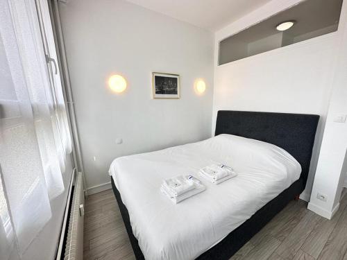 Postel nebo postele na pokoji v ubytování Un cocon paisible avec Balnéo proche centre ville