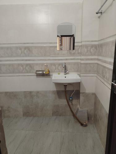 Ένα μπάνιο στο Aman Guest House