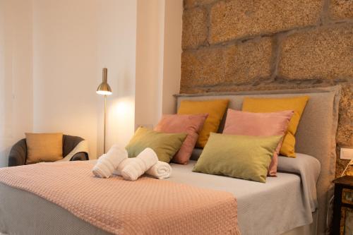 Postel nebo postele na pokoji v ubytování Central 18 - Homey Galicia