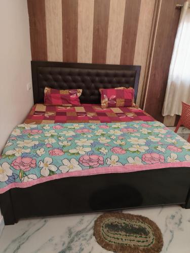 Ένα ή περισσότερα κρεβάτια σε δωμάτιο στο Aman Guest House