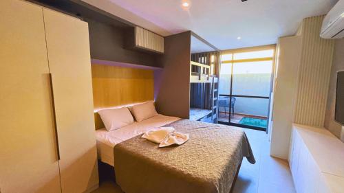 Katil atau katil-katil dalam bilik di Edificio Reserva do Cupe by Use Flats