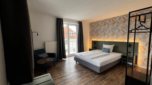 Postel nebo postele na pokoji v ubytování Hotel Siebeneichen