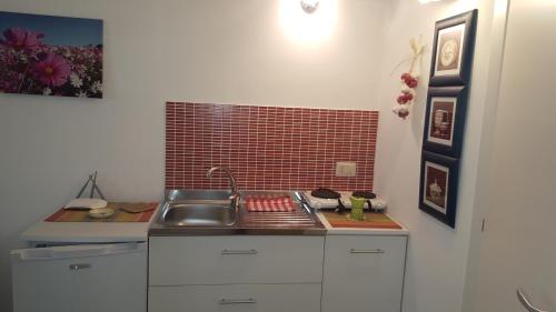 Kuchyň nebo kuchyňský kout v ubytování Casa Nave