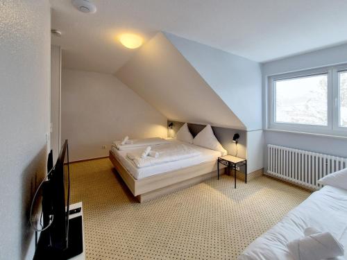 Postel nebo postele na pokoji v ubytování Hotel Schachener Hof