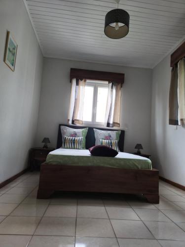 Ένα ή περισσότερα κρεβάτια σε δωμάτιο στο Appartement Maïmouna