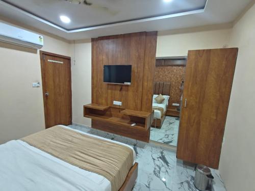 TV a/nebo společenská místnost v ubytování Hotel Royal King