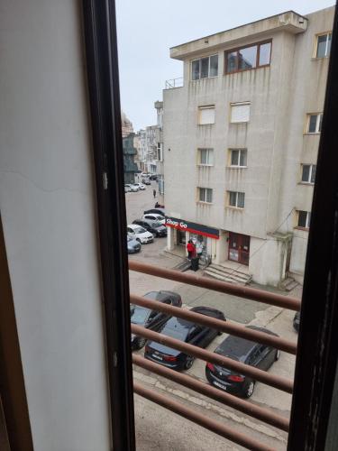 a view from a window of a parking lot at Great Black Sea View in Constanţa