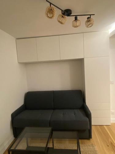 Χώρος καθιστικού στο Small comfy studio in Paris