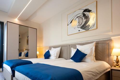 Postel nebo postele na pokoji v ubytování Le Blanc Cotroceni Hotel