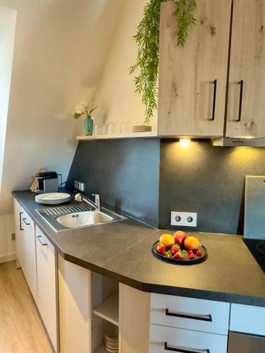Dapur atau dapur kecil di Living & Serviced Apartments by Blauer Wolf